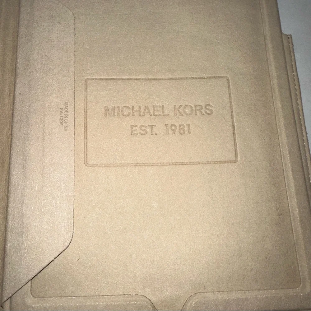 Michael Kors Padded flip over foldable IPad sleeve in purple